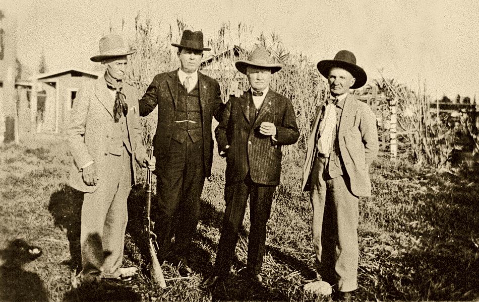 Emmett (second from left) with some of his Hollywood Western friends, including the cowboy detective Charlie Siringo (with rifle), 1927 /Kansas State Historical Society